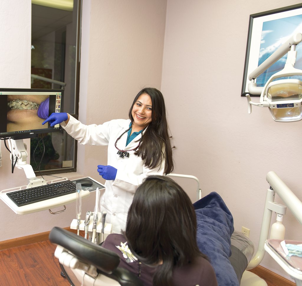 Dr. Insiya Saboowala with a patient at De Anza Smiles, Cupertino